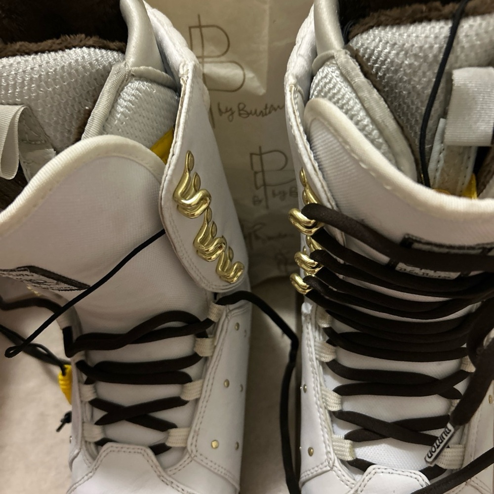 White and Gold ski boots size 6 women's or kids. Bought in Aspen 2 years ago